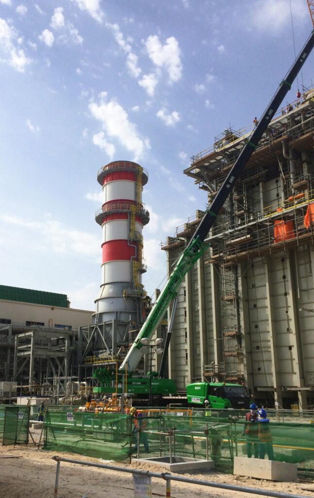 Crane and scaffolding at an industrial energy facility under construction